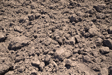 Closeup plowed black soil.