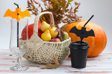 Pumpkin and paper cups with bats. Halloween Decoration