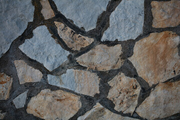 Twenty years old wall with rocks in abandoned Kastri greek village retro background high quality big size print