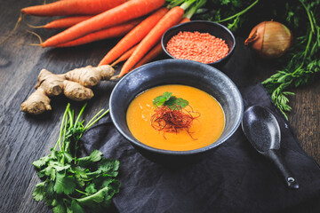Roasted pumpkin and carrot soup with  red lentils, ginger and chili