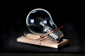  light bulb in wooden mousetrap