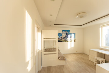 Cute child's room interior with toys and modern furniture