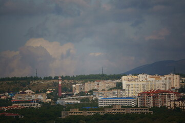 time clouds over city