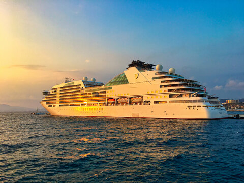 "SEABOURN ENCORE, Nassau" cruise ship at sunset in the harbor of Kusadasi, Aydin, Turkey, Turkiye. - 28 september 2022