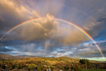 Fototapeta na wymiar Rainbow Over The Mountains