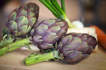 artichokes on a wooden table