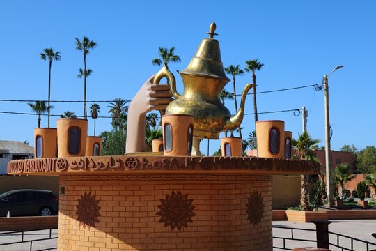 TAROUDANT, MOROCCO - FEBRUARY 16, 2022: Large teapot and tea cups monument in Taroudant, Morocco. The city is the capital of Taroudant Province in Sous-Massa region.
