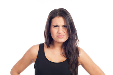 portrait of angry young brunette woman screaming