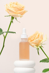 Mockup cosmetics serum with a pipette in a transparent frosted glass and orange liquid. Facial peeling with lactic Aha acid on a white pedestal, beige background with roses