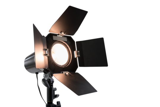 Glowing studio strobe light with barn doors isolated.