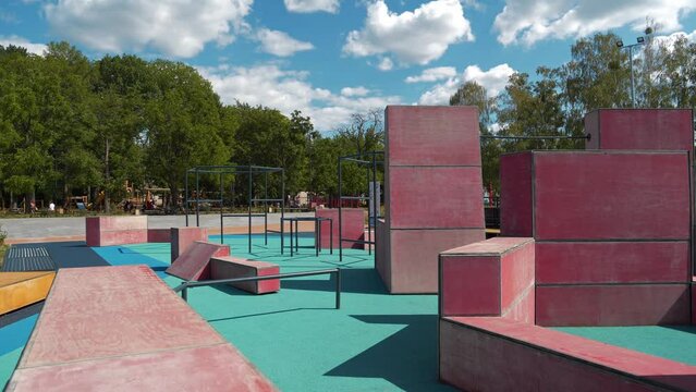 Sports ground with exercise equipment in open air zone for parkour and freerunning