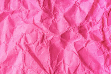 Decorative background. Texture from crumpled pink paper