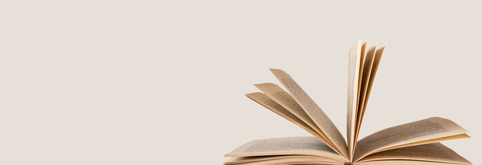 Banner with open book. Turning pages. Intelligence, wisdom, education concept. Copy space