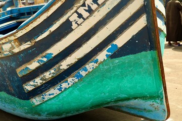 Fragment of colourful fishing boat in Essaouira, Morocco 