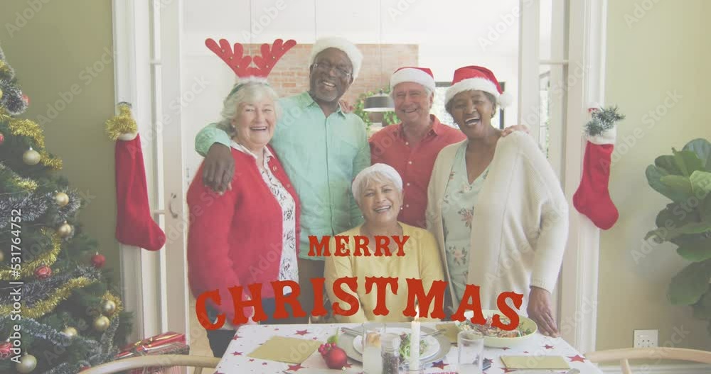 Poster Animation of merry christmas text over senior diverse friends smiling