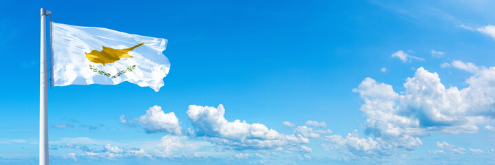 Cyprus flag on a blue sky *** Horizontal banner 12000 x 4000 px
