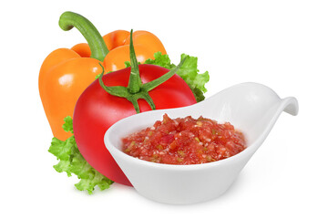 bowl of tomato sauce or Ajvar and tomato, pepper isolated on a white background. Pepper, tomato and...