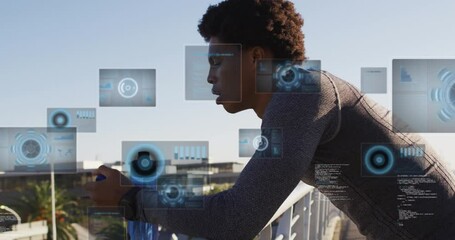 Animation of data processing over african american man drinking water - Powered by Adobe