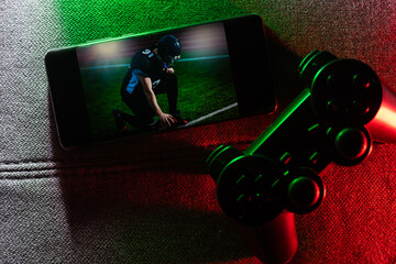 Smartphone and two game joysticks. Minimalism. Cybersport concept. Streaming. © Angelov