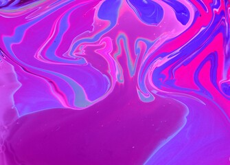 Abstract lilac marble background. Acrylic paint flows freely and creates an interesting pattern. Background for the cover of a laptop, notebook.