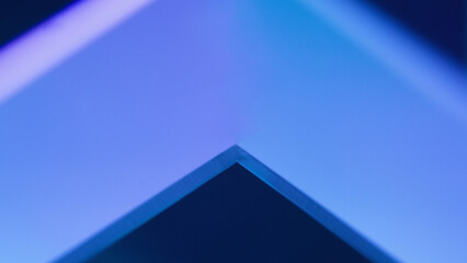 Luminous abstract background. Blur neon light. Bokeh glow. Defocused tranquil blue purple color gradient futuristic geometric copy space wallpaper.
