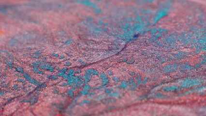 Fluid magic. Creative art. Abstract painting. Pink blue glitter liquid paint mix
