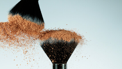 Brown makeup powder on brushes.