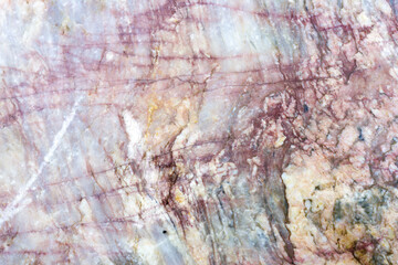 Natural stone marble rock surface by the stream.  Stone marble texture background.Selective focus.