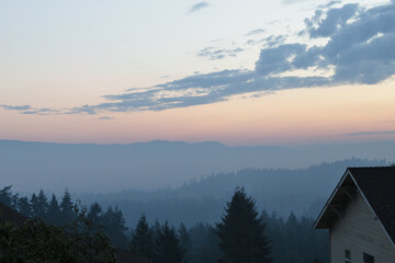 Fog combined with smoke from the Cedar Creek wildfire hang over Eugene, Oregon in the early morning...