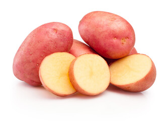 Red potatoes cut in slices isolated on white background