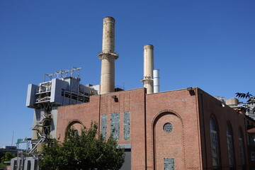 Stacks and piping of a fossil fuel-burning power plant in Washington D.C.