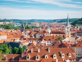 Fototapeta na wymiar Aerial view with the beautiful city of Prague and the red brick roofs of the old houses in the old town , Czech Republic