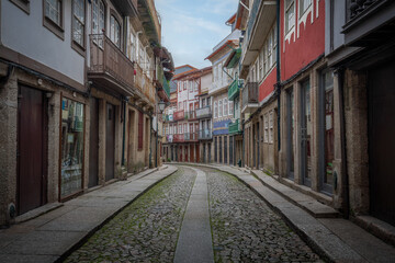 Fototapeta na wymiar Old Street and Buildings - Guimaraes, Portugal