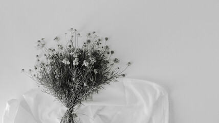 Bunch of flowers in minimalism style, black and white background.