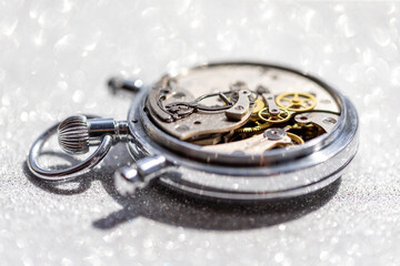 An old countdown timer opened up showing all the details of the mechanism, macro closeup