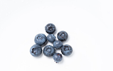 Blueberry fruit in close-up. Ripe fruit, blueberry berries isolated. Background with fruits.