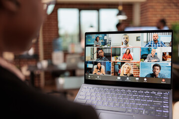 Startup manager talking on online videocall conference with business people, using remote teleconference chat on internet meeting with webcam. Chatting on videoconference in company office. - obrazy, fototapety, plakaty