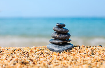 Zen Stones on the beach. Spa therapy. The concept of purity, balance and harmony.