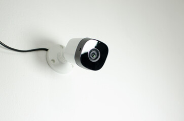 CCTV videocam, CFTV security camera, white camera with secure circuit, theft protection....