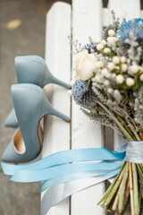 blue shoes and a bouquet