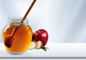 Fresh ripe Apples and honey in the jar