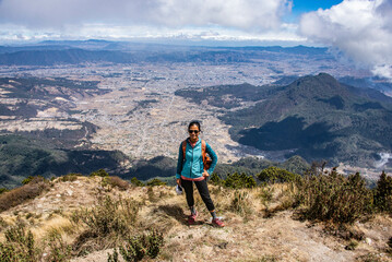 Tourist above Santa Maria volcano, Quetzaltenango, Guatemala