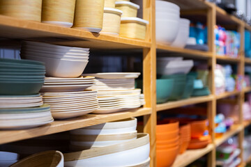 Variety of plates and bowls in modern household shop
