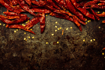 Red, dried bird's eye chili or Thai chilli peppers, hot and spicy Capsicum for sambal, chile sauces, pastes, marinades, condiments for cooking Asian cuisine dishes, top down view, space for copy text - 531805371