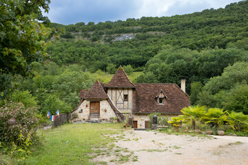 Fototapeta na wymiar Ancient medieval house in France, Dordogne, in the forest, nice travel destination