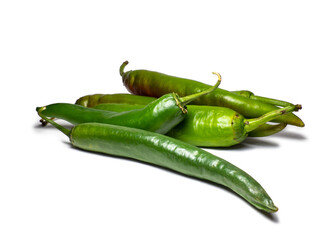 Fresh green chili peppers. Spicy vegetable isolate. Peppers on a white background. Ingredient for dishes. The concept of spicy food. Fresh . Harvesting vegetables for seasonings.