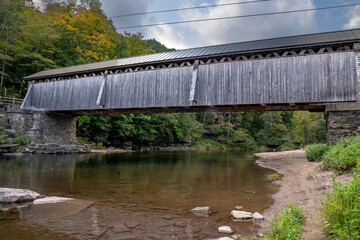 Roscoe, NY - USA - Sept 17, 2022 Horizontal view of the Beaverkill Covered Bridge, also known as the Conklin Bridge, a wooden covered bridge over the Beaver Kill north of the hamlet of Roscoe.