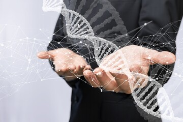 A scientist hand with DNA strands image