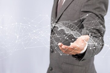 A scientist hand with DNA strands image