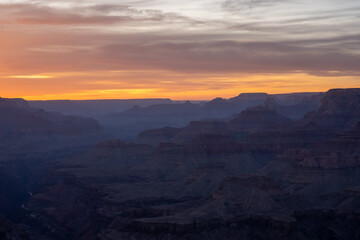 Yellow and Purple Clouds Hover Over the Grand Canyon